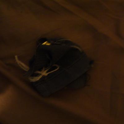 E jp1030377papillote fait avec un medaillon porte en poche contre l